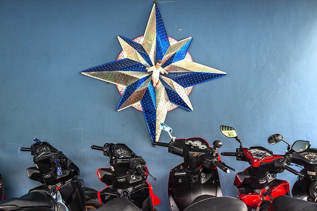Baby Jesus and motorbikes--Saigon