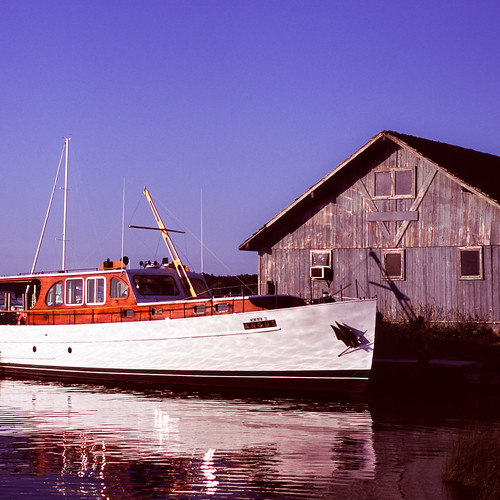 velvia100 antique leicam6 weathered reflection boat boathouse slidefilm beaverisland film michigan unitedstates us