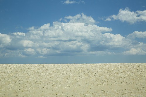 chincoteague virginia sand dune dunes sky blue clouds seaside shore beach summer