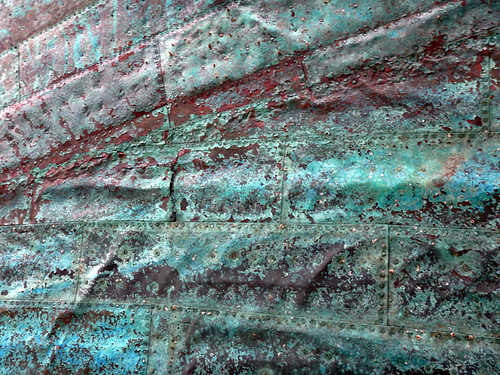 The copper verdigris cladding of the frigate in Ebeltoft, Denmark