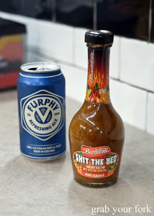 Furphy ale and Shit The Bed hot sauce at Huxtaburger in Redfern Sydney