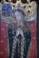 St Agatha with a sword through her neck (rood screen, 15th Century, restored)