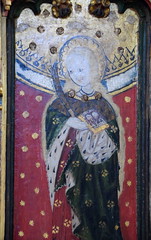 St Lucy with her disgouged eyes and a martyr's palm (rood screen, 15th Century, restored)