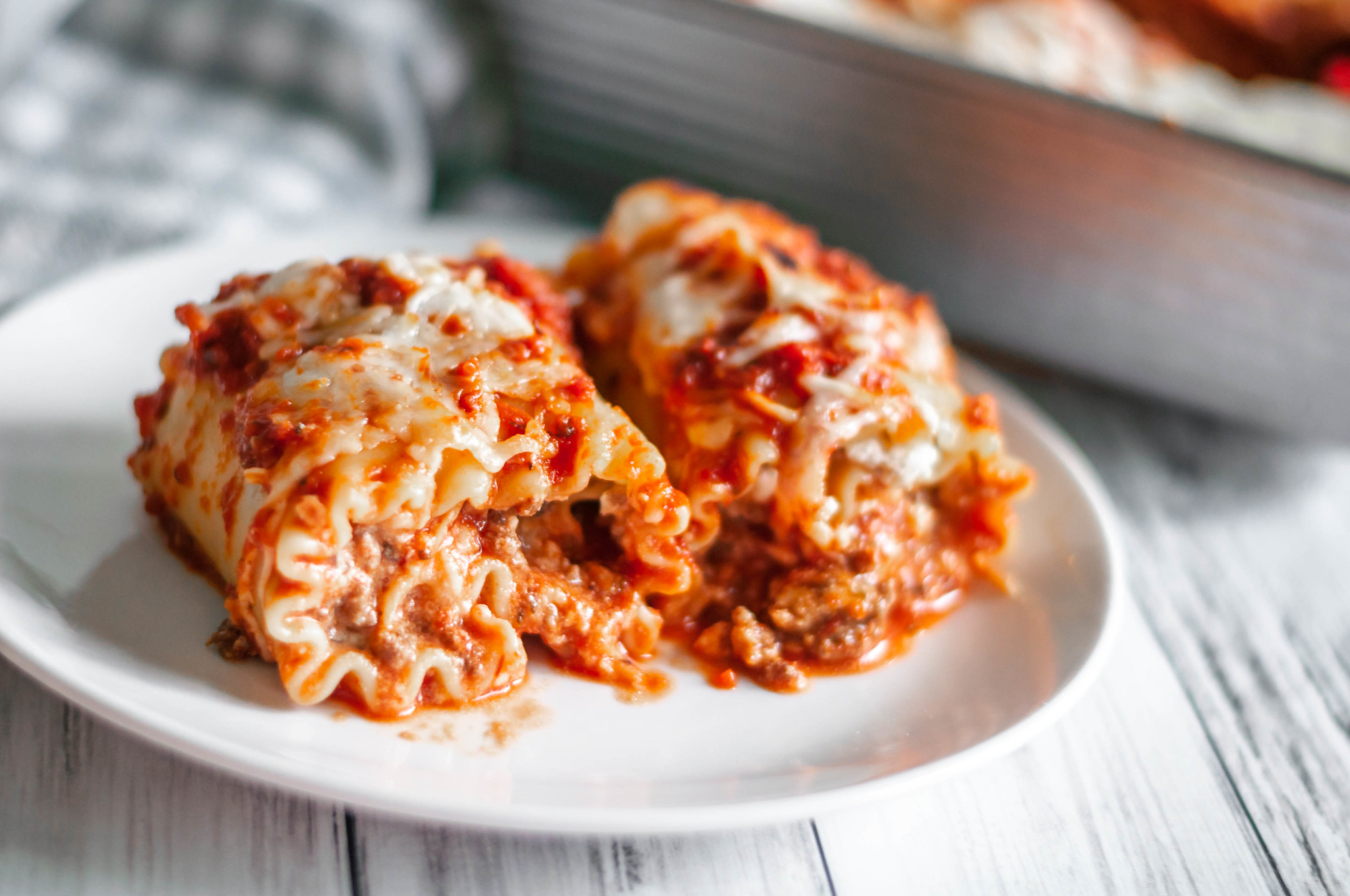 Lasagna Roll Ups are the perfect weeknight dinner when you want that traditional lasagna flavor but only have an hour. And freezer friendly too.