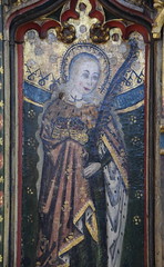 St Dorothy with a basket of flowers and a martyr's palm (rood screen, 15th Century, restored)