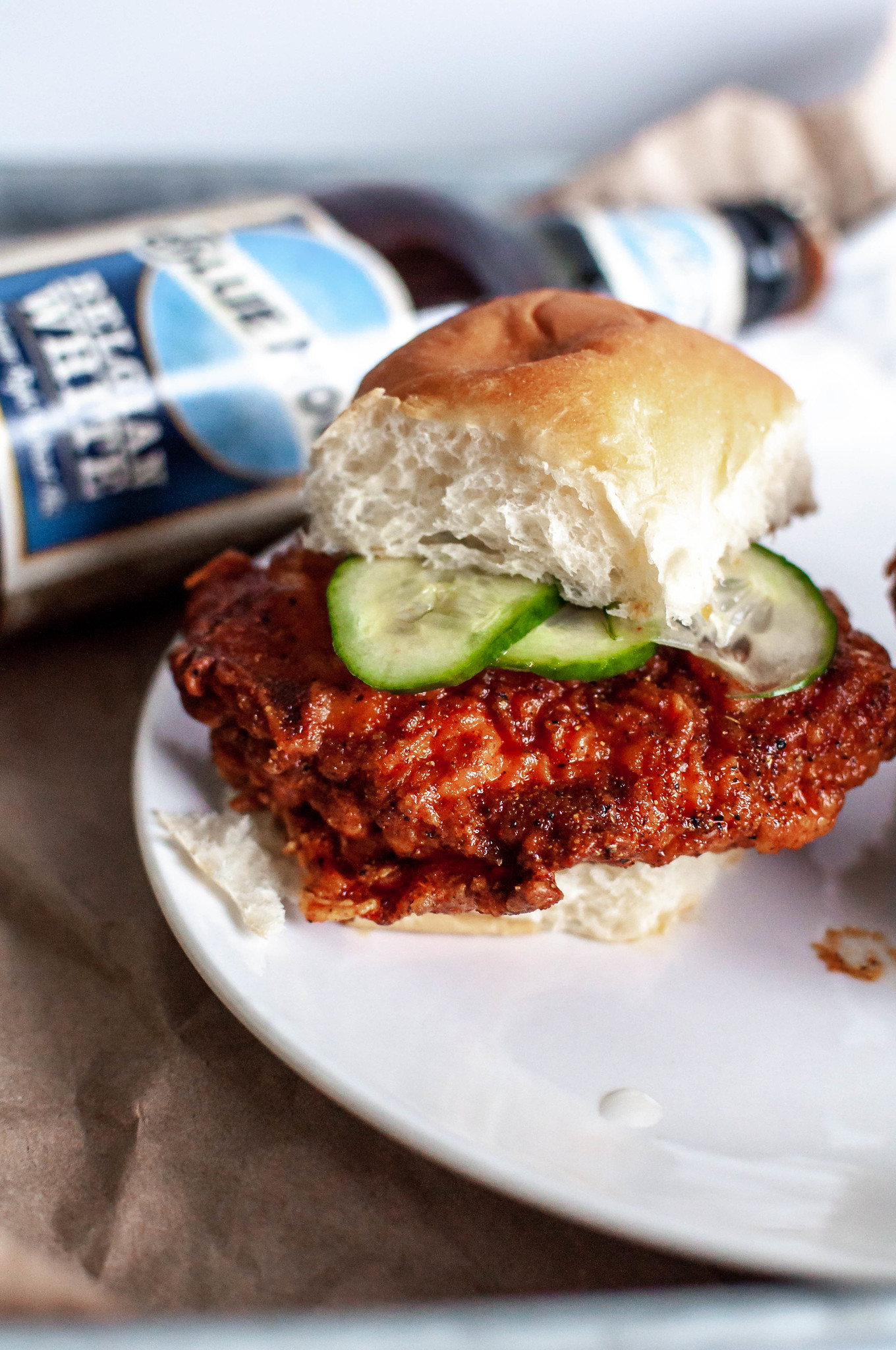 Hot Chicken Sliders with Quick Pickles are the ultimate game day food. Soft, buttery bread, crispy fried chicken, spicy sauce and fresh, crunchy pickles. 