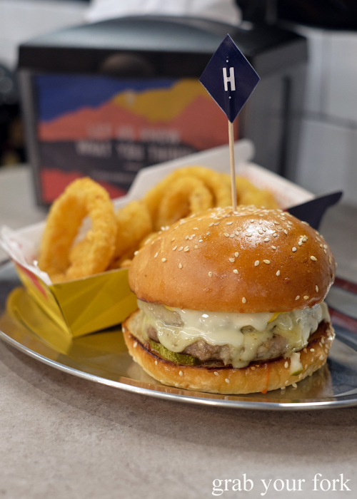 Cheesus burger and onion rings at Huxtaburger in Redfern Sydney