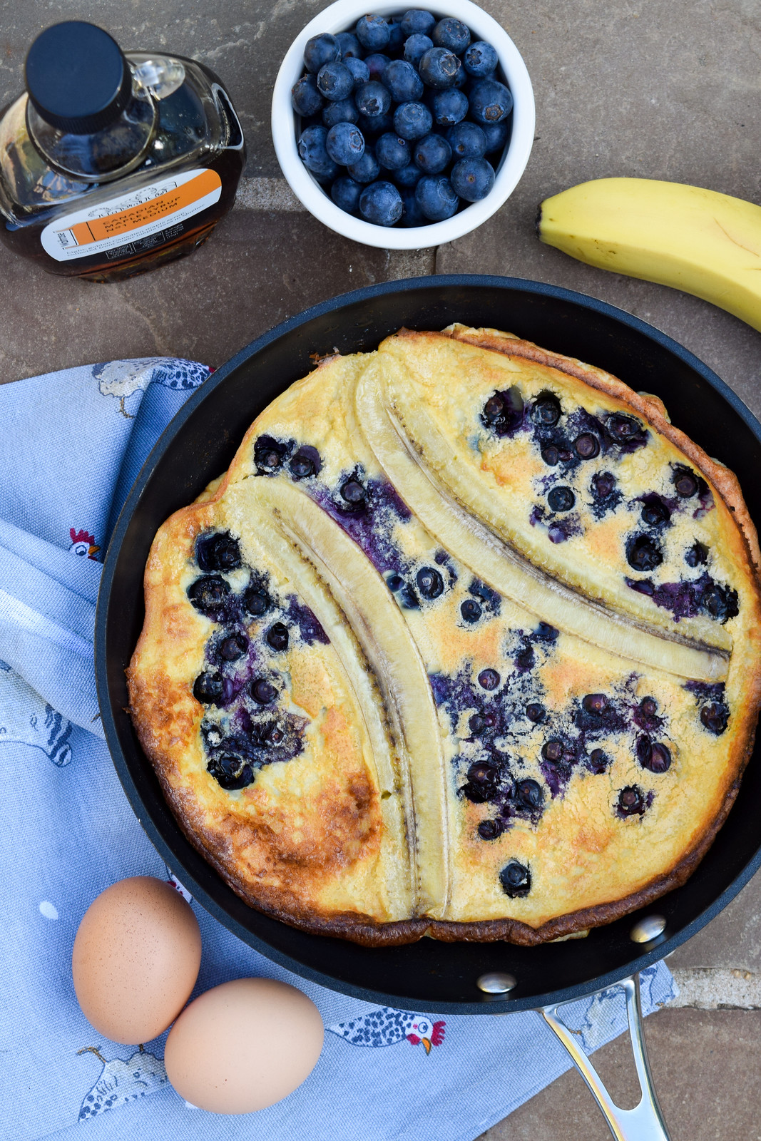 Banana & Blueberry Dutch Baby Pancake with Maple Syrup
