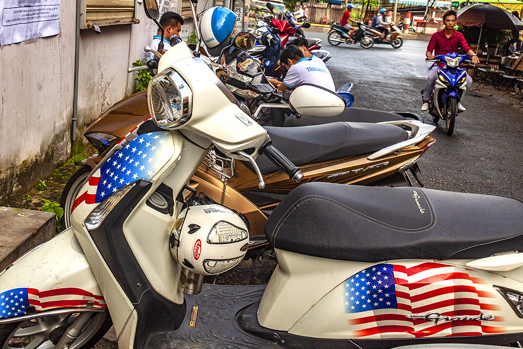 American flags on motorbike--Saigon