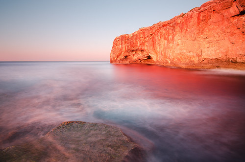 bay water sky rock mallorca red sea landscape sunrise