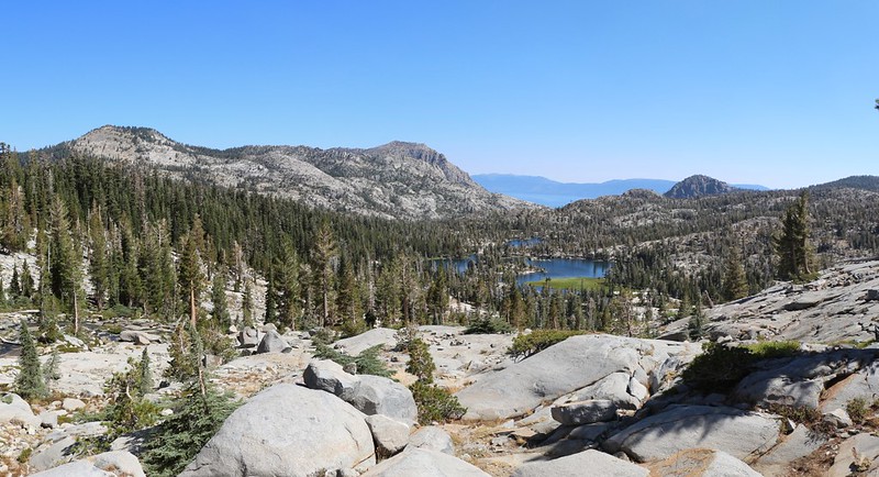 Phipps Peak on the left, Lower Velma Lake below, and Lake Tahoe in the distance from the PCT