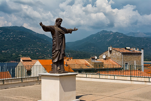 propriano corsica chuch statue christ mountains