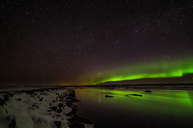 Northern lights over river in iceland
