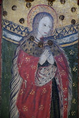 St Agnes with a dagger through her neck (rood screen, 15th Century, restored)