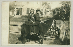 Two children on horseback
