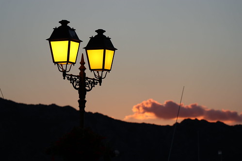 corsica streetlamp sunset clouds