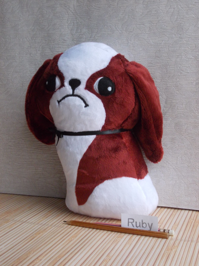 red and white stuffed dog