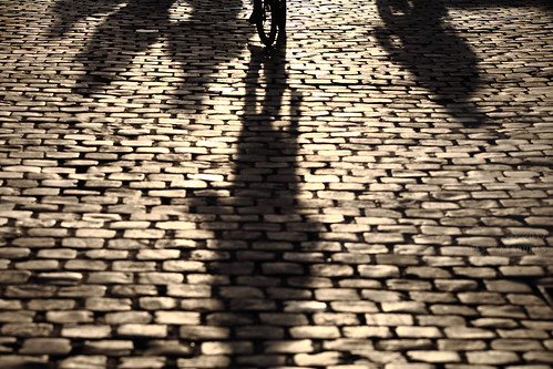 horizontal outdoors people shadows silhouette bicycle bike cycling bicyclist peopleonbicycles fiets longshadows backlight sunset sunlight street road cobblestone wheel stone dof depthoffield focusinbackground foregroundblur colour color travel travelling november2017 canon 5dmkii photography ghent gent belgium belgique flanders flemishregion europe