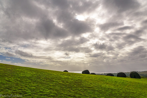 travel chile polynesia rapanui easterisland nature landscape grass water ocean sky cloud punapau quarry pukao hill
