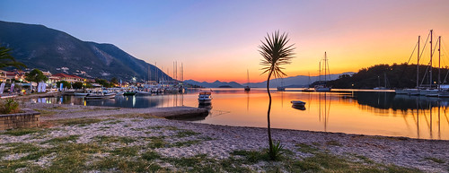 nydri lefkada sunrise beach harbour water reflection greece ionian