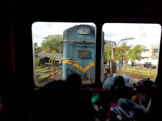 Galle to Colombo Train on the Coastal Line of Sri Lanka. The locomotive is approaching the observation car for the return journey to Colombo Fort.