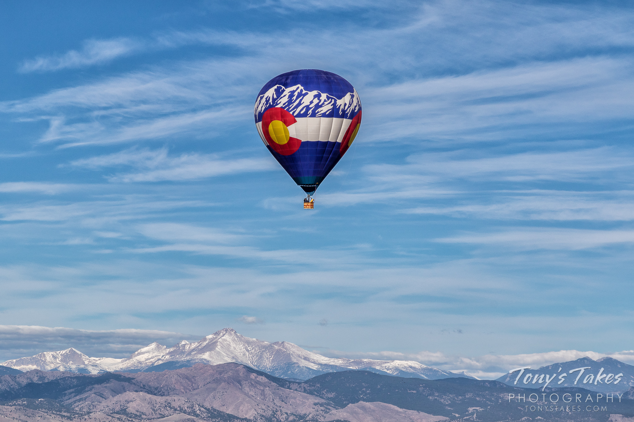 Colorado hot air balloon flies high with Mount Meeker below