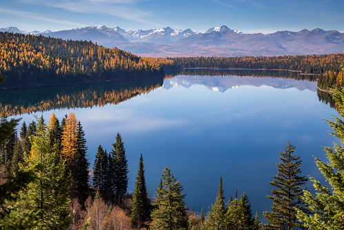 mission mountains montana swan valley holland lake overlook fall larch water trees yellow color reflection