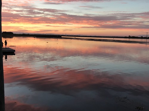 sunset water sky clouds pink orange blue shadow reflection stgeorgeisland apalachicolabay gulf