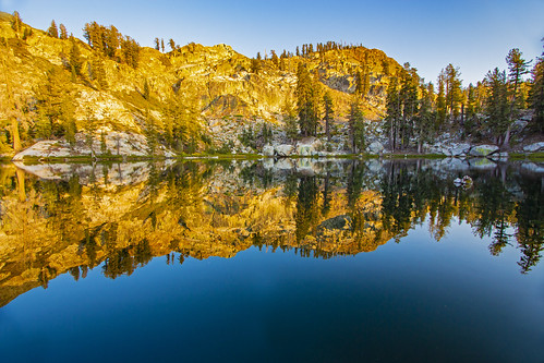 bareislandlake california maderacounty sierranationalforest backpacking camping granite lake quiet reflection serene sunlight sunset