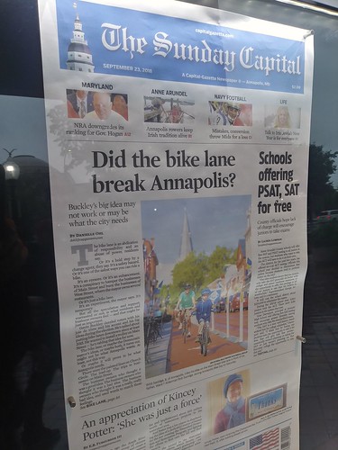 Front page of the Annapolis Capital newspaper, Sunday September 23, 2018, featuring an article on bicycling