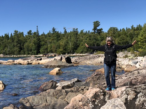 Lake Superior Park Linda balancing on rocks