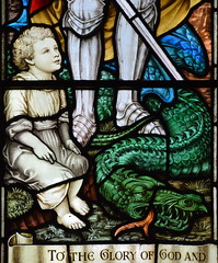 child and dragon at the feet of St George (A L Moore, 1927)