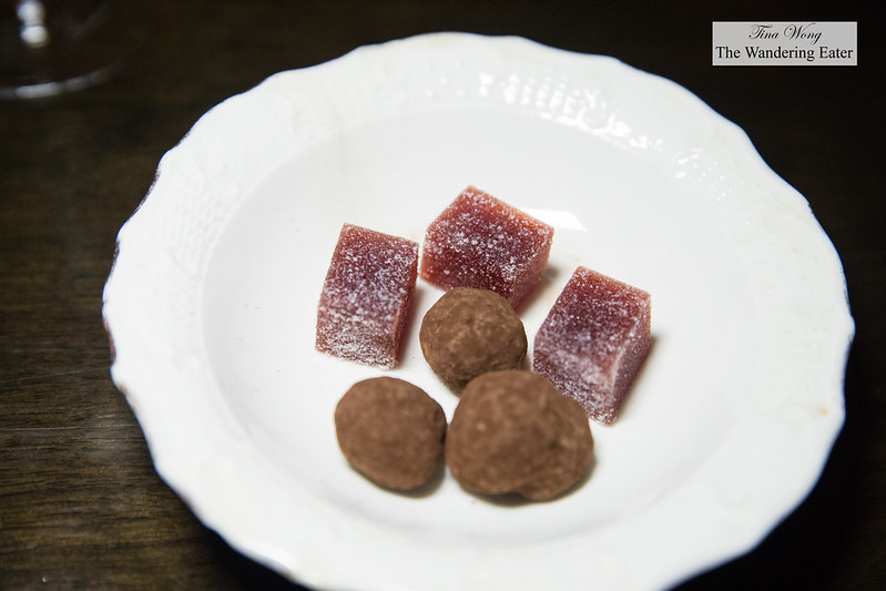 Petit fours of chocolate almond truffle and raspberry pâte de fruit