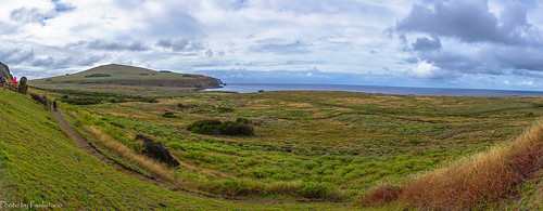 travel chile polynesia rapanui easterisland ranoraraku volcano landscape sky cloud water field grass tukuturi ahutongariki poike ocean moai sculpture ancient road people