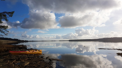 loch calder caithness scotland highlands sea kayaks a calm viewed from tulloch assery