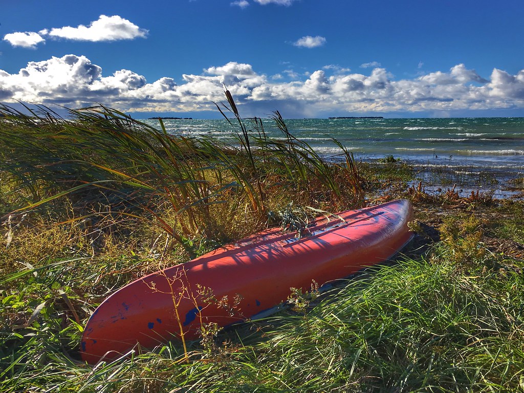 Red Canoe At Red Bay