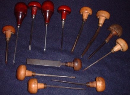 A collection of gravers tools used for engraving.