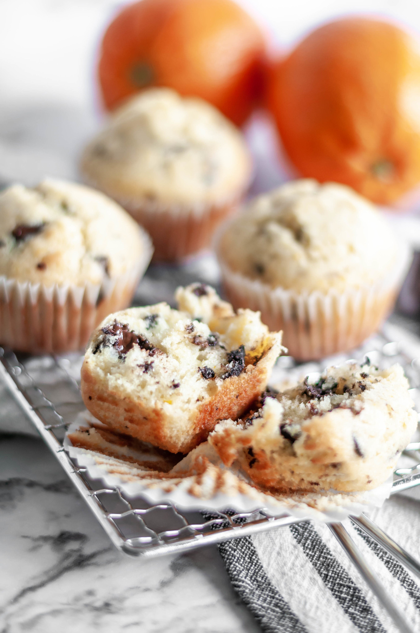 Orange Chocolate Chunk Muffins are light and easy to mix up. Dotted with dark chocolate chunks and sweet orange zest.