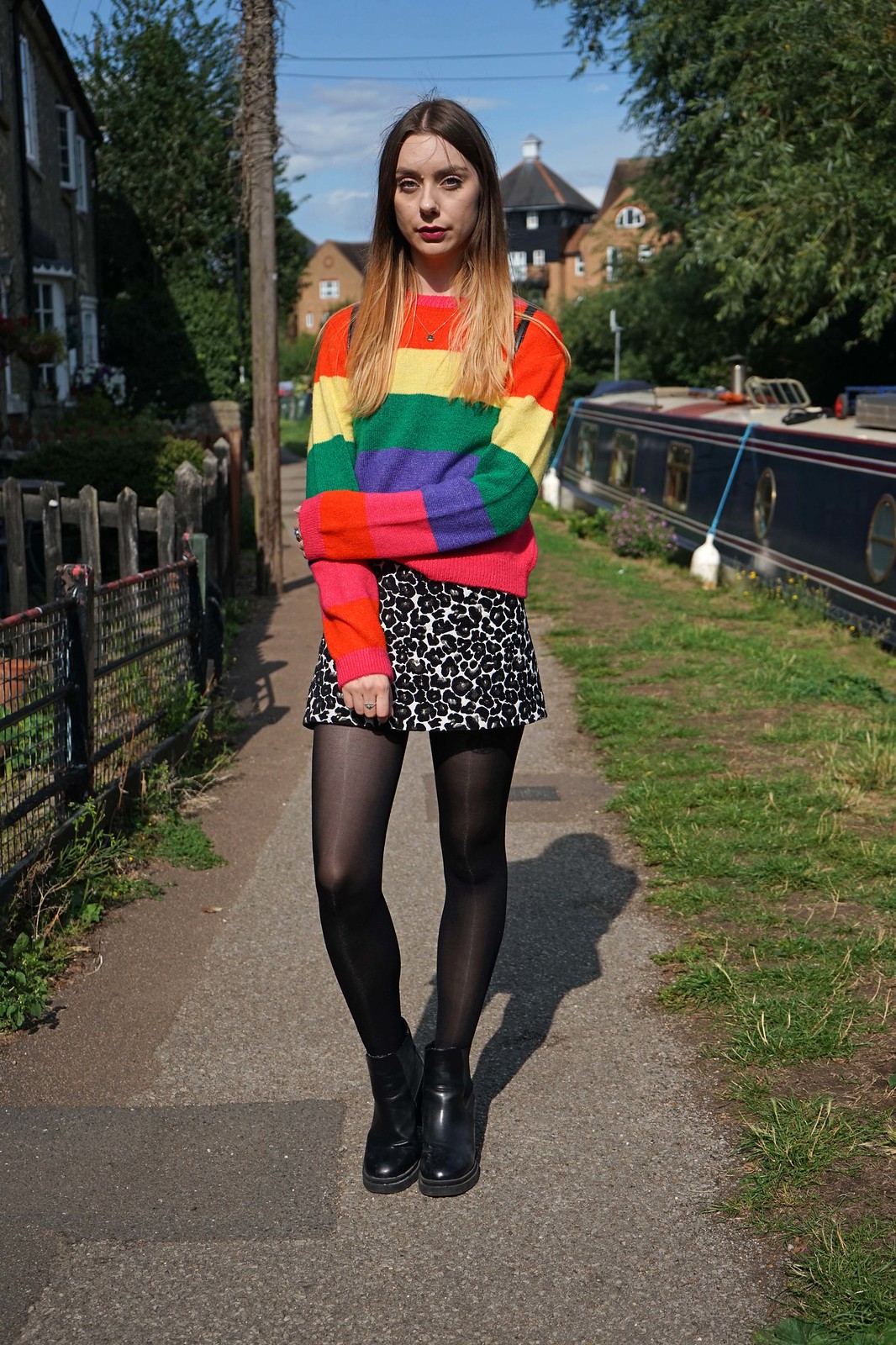 Primark rainbow striped jumper and a leopard skirt