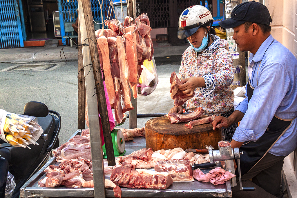 Butcher in District 6 alley--Saigon