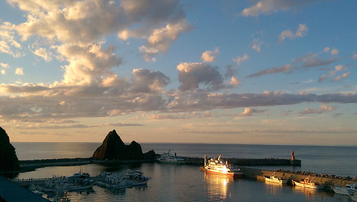 japan hokkaido utoro harbour sunset ship boat island rock sea cloud