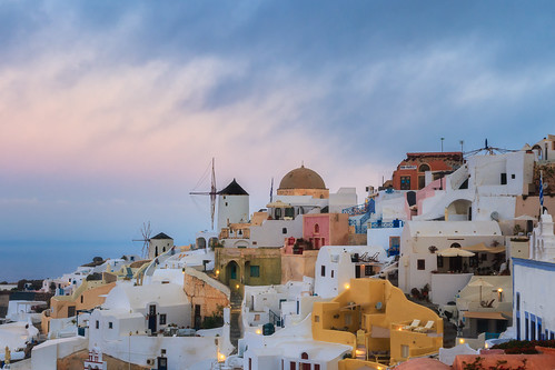 agriculturalbuildings citylandscape colourful colours cyclades europe greece houses morning oia pastel residentialbuildings santorini southaegean southerneurope sunrise thira travel windmill cityscape