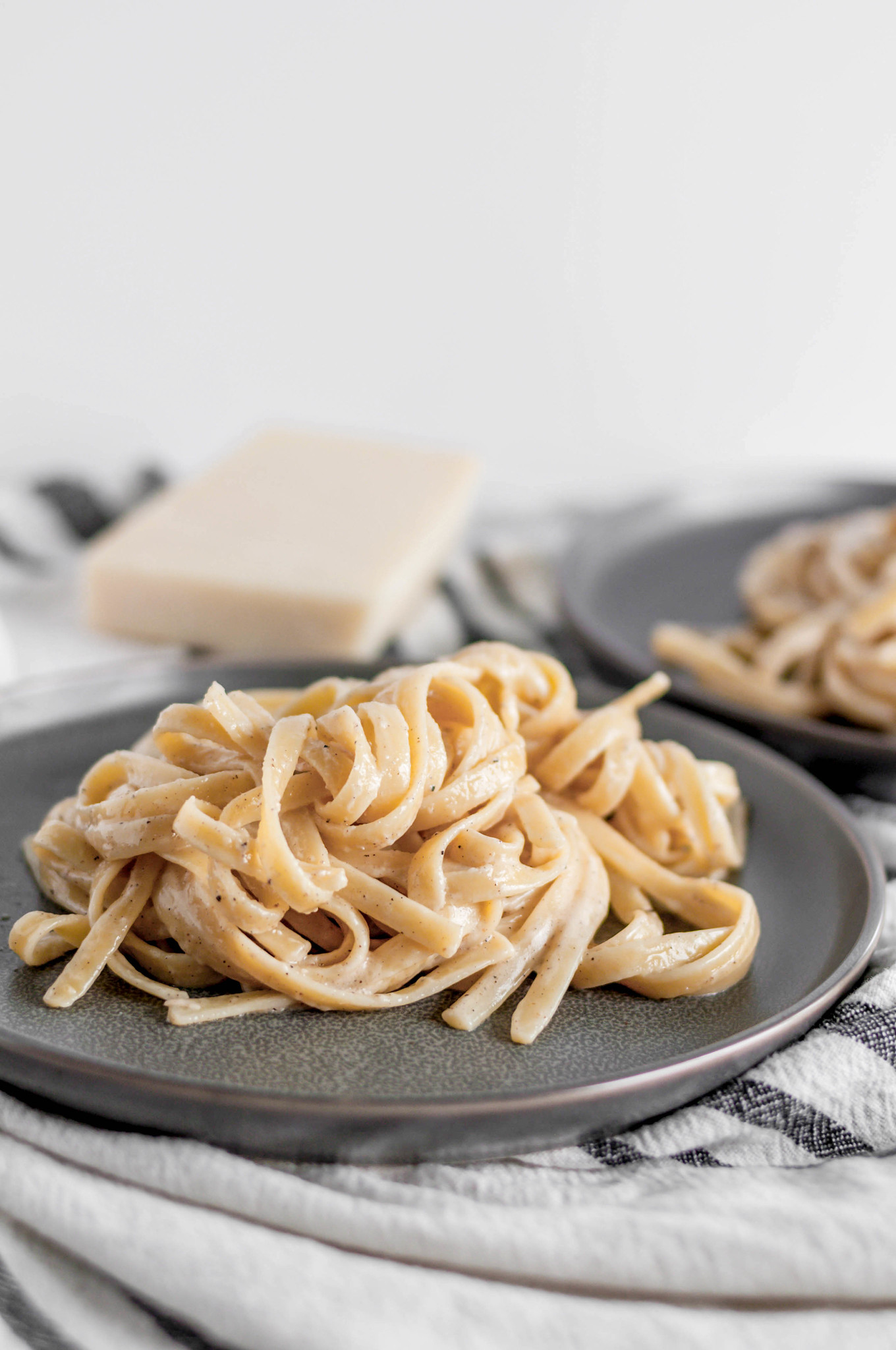 Roasted Garlic Alfredo will quickly become your go to weeknight meal. Garlicky, cheesy, nutty and done in less than 30 minutes.