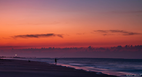 morning beach fishing clouds nature water landscape sky sunrise vacation ocean orange fisherman
