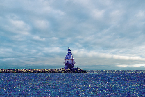 lighthouse blue ocean landscape clouds newhaven connecticut unitedstates us sea sky water architecture tower