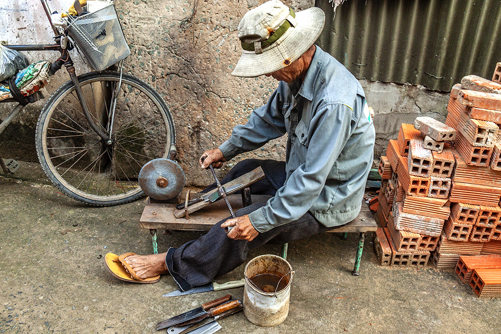Knife sharpener in my alley--Saigon