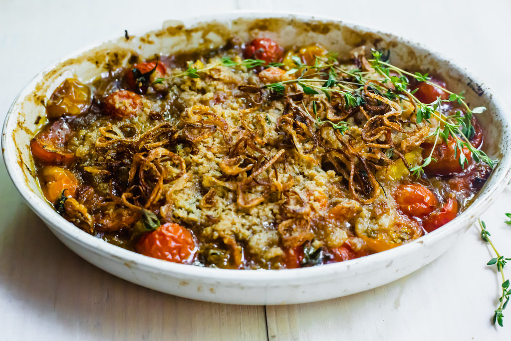 End of summers tomatoes is the perfect time to make a savory tomato crumble topped with crispy fried shallots and herb crumb topping.