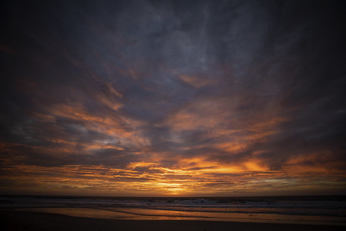 sunrise clouds amber gold orange ocean beach water color reflection oceancity maryland md oc atlanticocean atlantic
