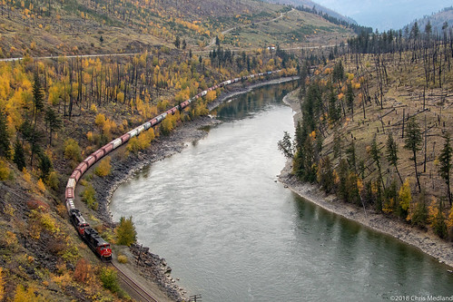 train railroad mainline freight grain empties river canyon fall cnr emd railway