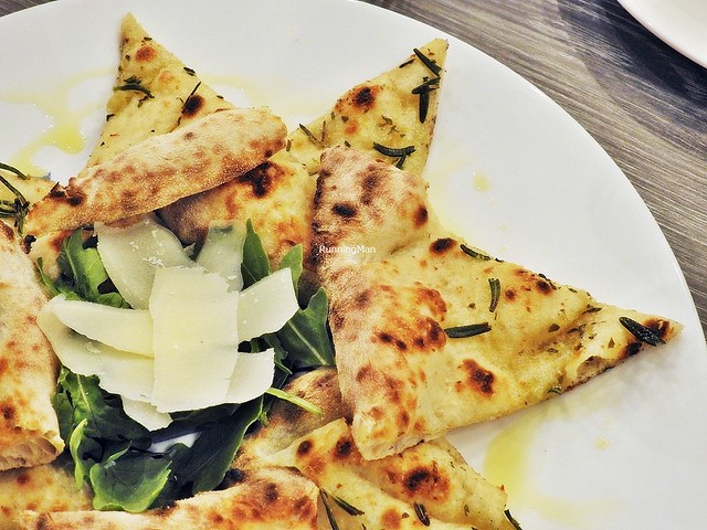 Pizza Crust With Rocket Leaves